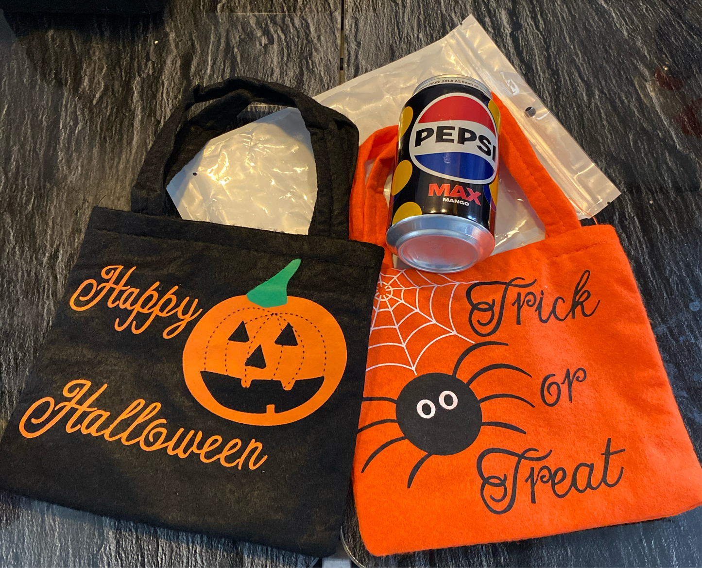 Twin pack fabric trick or treating bags , can there for size comparison