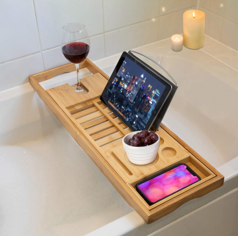 Bamboo extendable bath caddy with holders for pretty much everything!